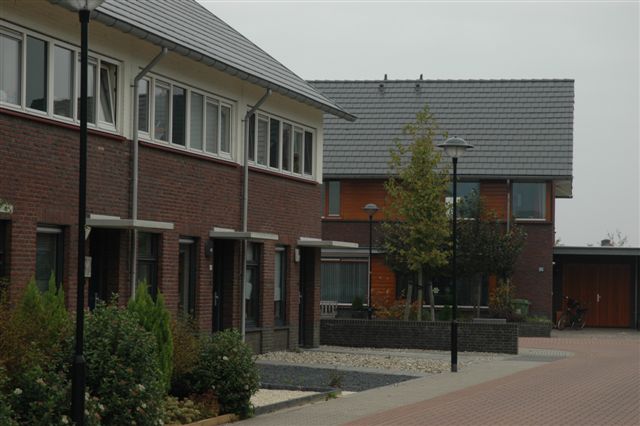 foto van de voortuinen na oplevering van de huizen