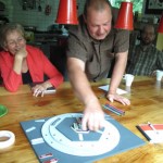 iemand werkt met de praat-pizza